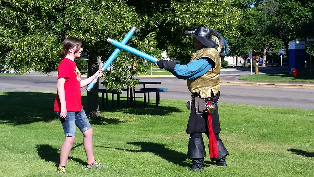 Sword fight between student and instructor